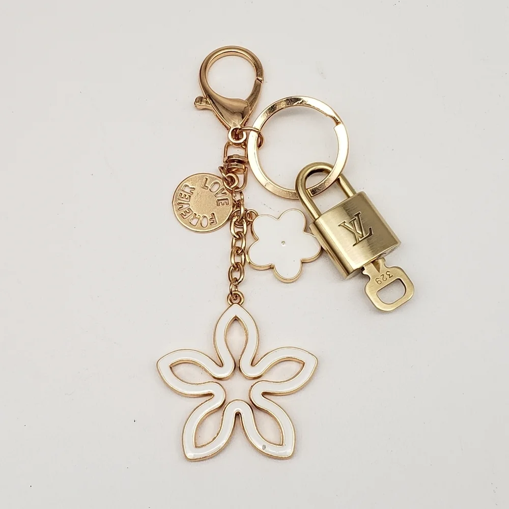 Authentic Louis Vuitton Gold Lock & Key 🔑 Bag Charm w/ Unbranded Clover Charm
